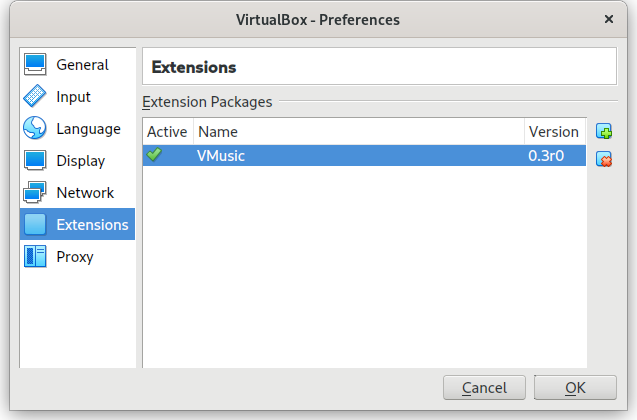 VirtualBox Preferences dialog showing Extensions panel with VMusic installed